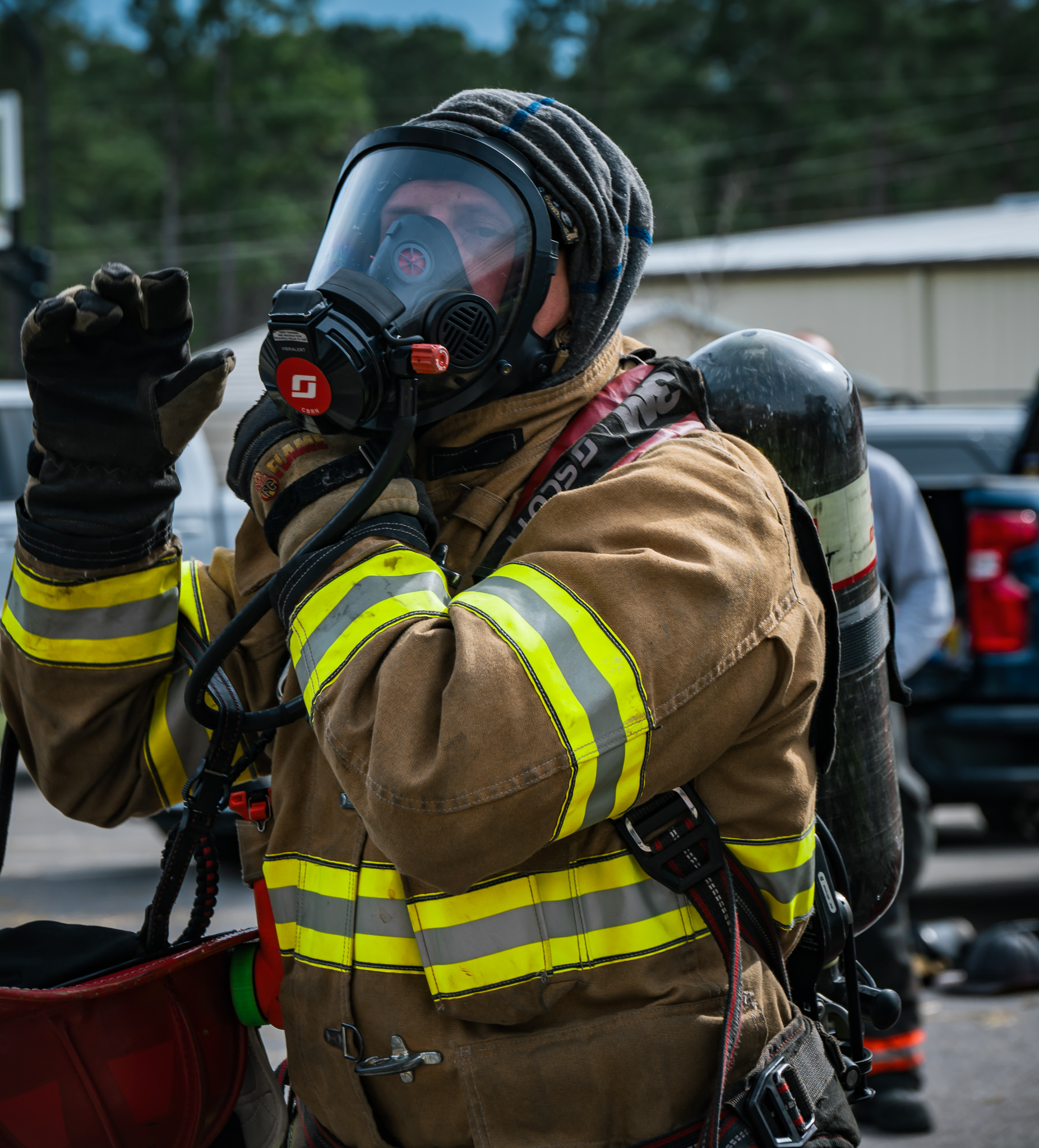 SCBA masked firefighter ready